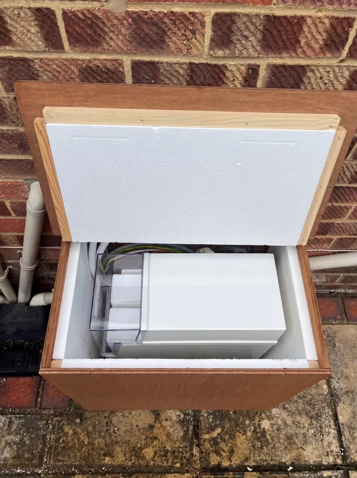 Outdoor insulated cabinet for garage runs Winchester